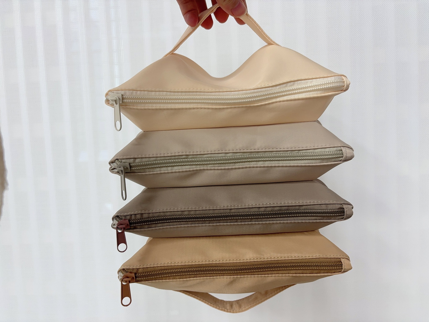 rts: Four Zipped Pocket Accordion Bag