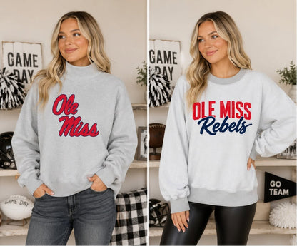 PREORDER: The Rally Club Reversible Mock Neck Sweater RERUN 10.26.26